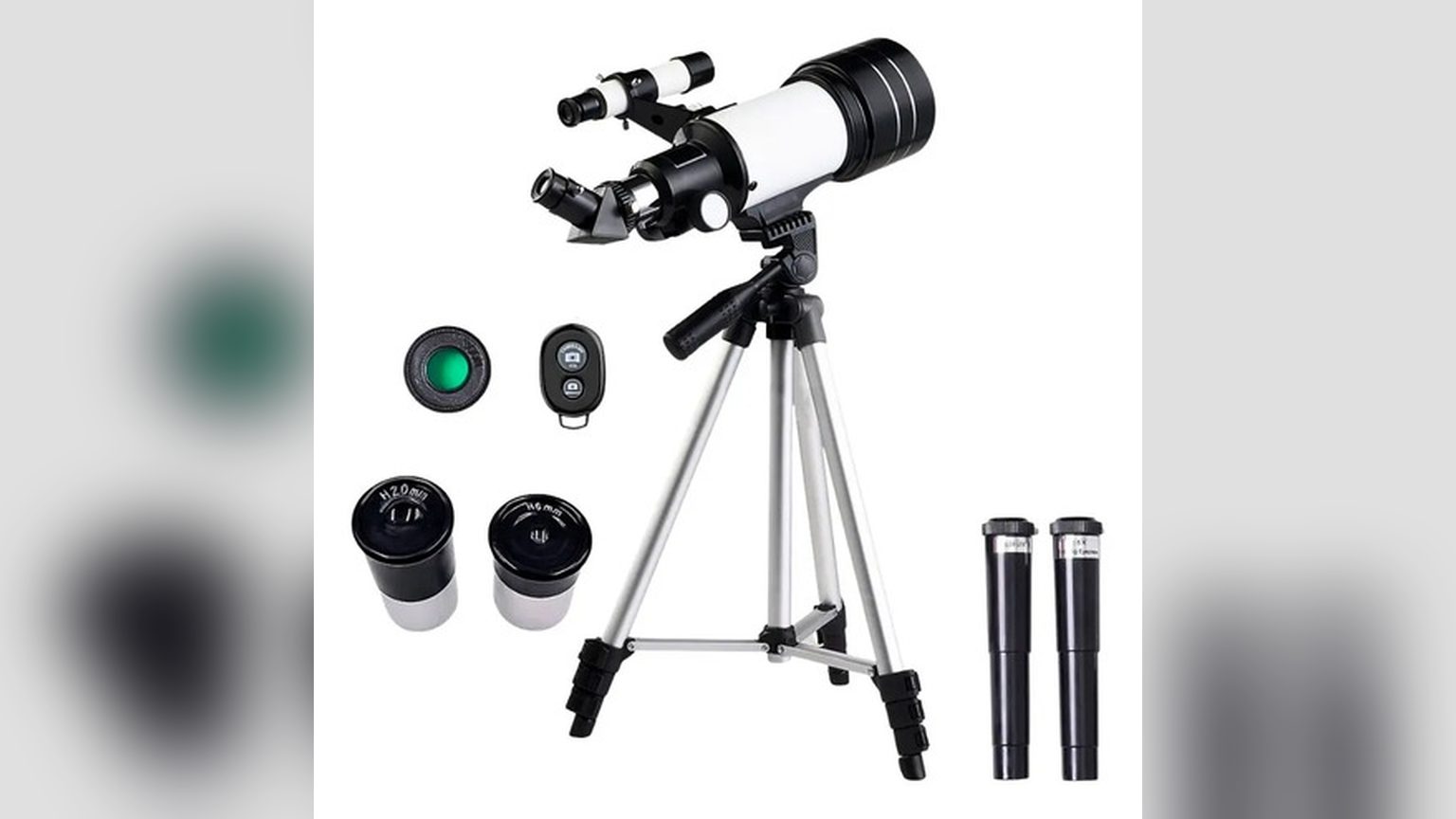 Telescopio Monocular HD 50X BAK4 con smartphone acoplado al trípode, apuntando hacia un cerro con vegetación.